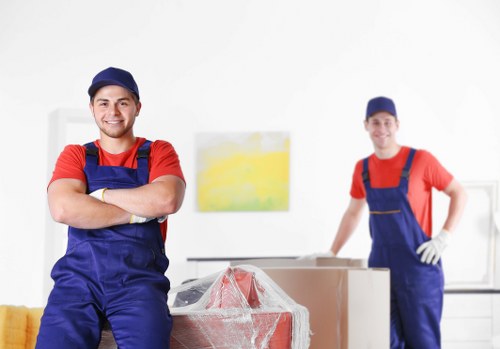 Local team handling sofa and bed removal in a Fulham street