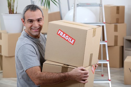 Careful handling of household items during a move in Fulham