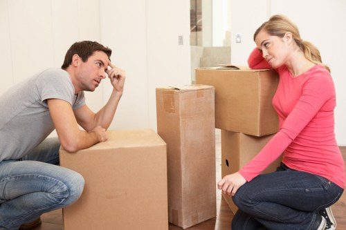 Unpacking household items in a Fulham flat after a move