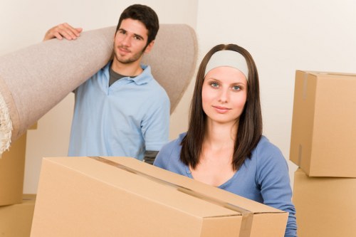 Local house removalists loading boxes outside a Fulham property