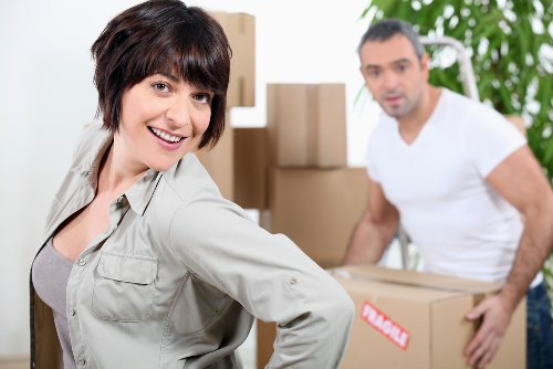 Trained removal staff transporting furniture safely in Fulham