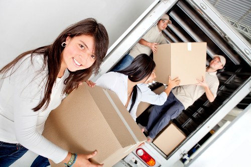 Careful furniture removal from a Fulham apartment building