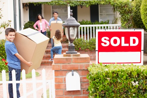 Packed business items and labelled boxes for a commercial relocation