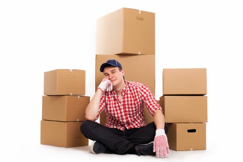 Furniture and boxes being loaded into a moving van in Fulham